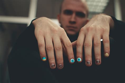 Why Guys Paint Their Nails Black: A Dive into the Shades of Expression